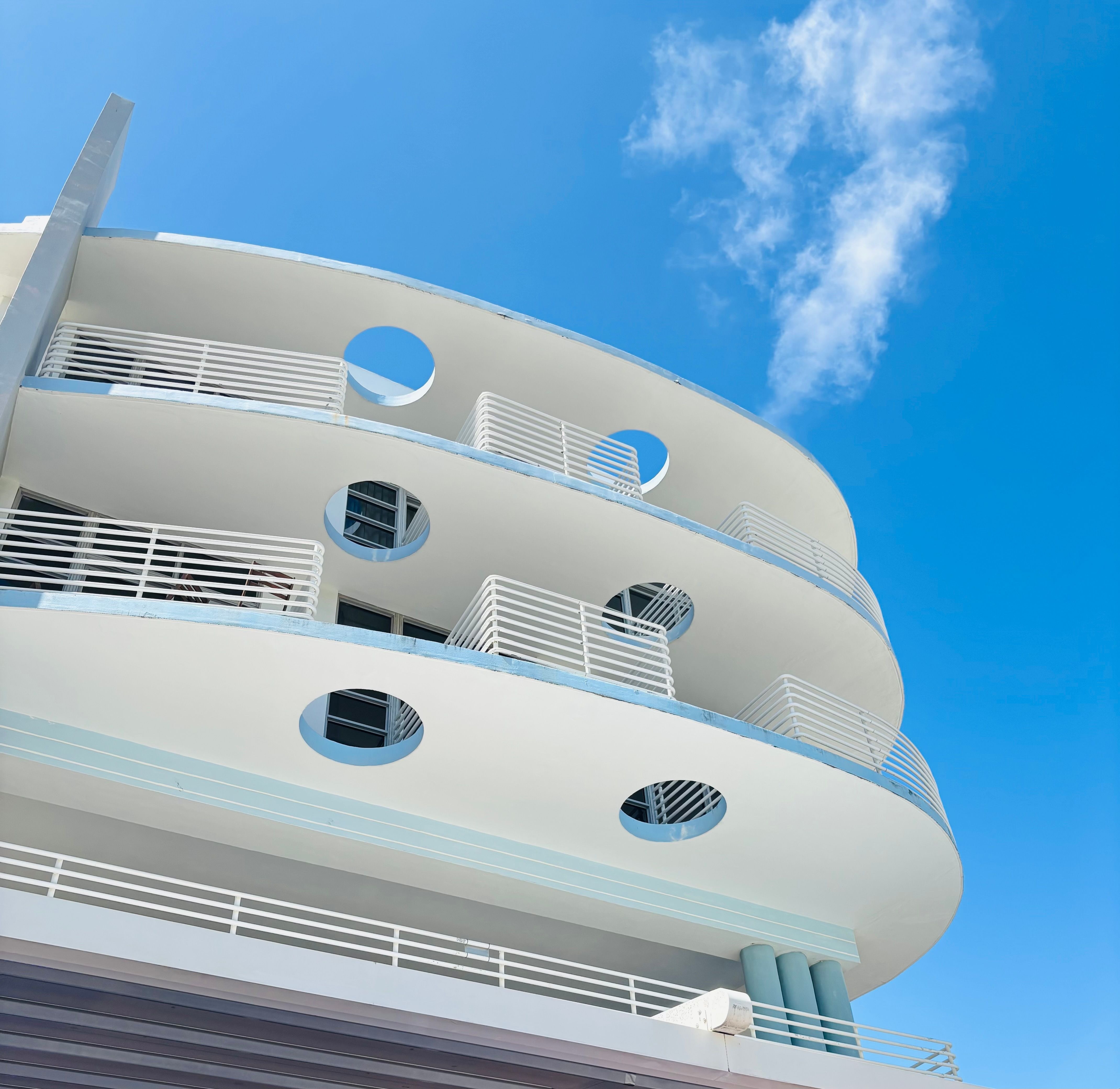 White decks of a cruise ship against blue sky